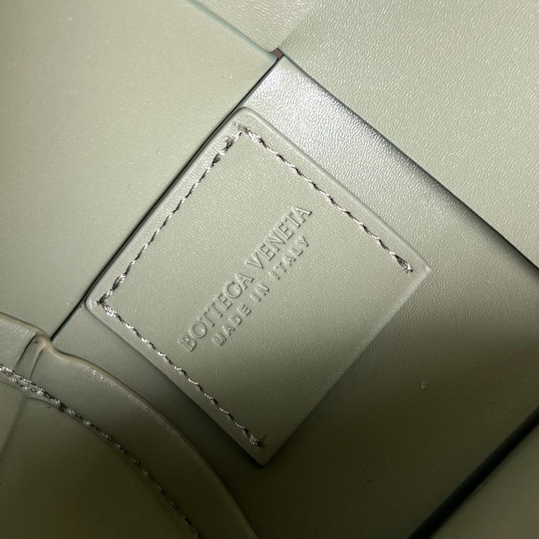 BOTTEGA VENETA SMALL CYLINDER CASSETTE 21 IN TRAVERTINE CALFSKIN