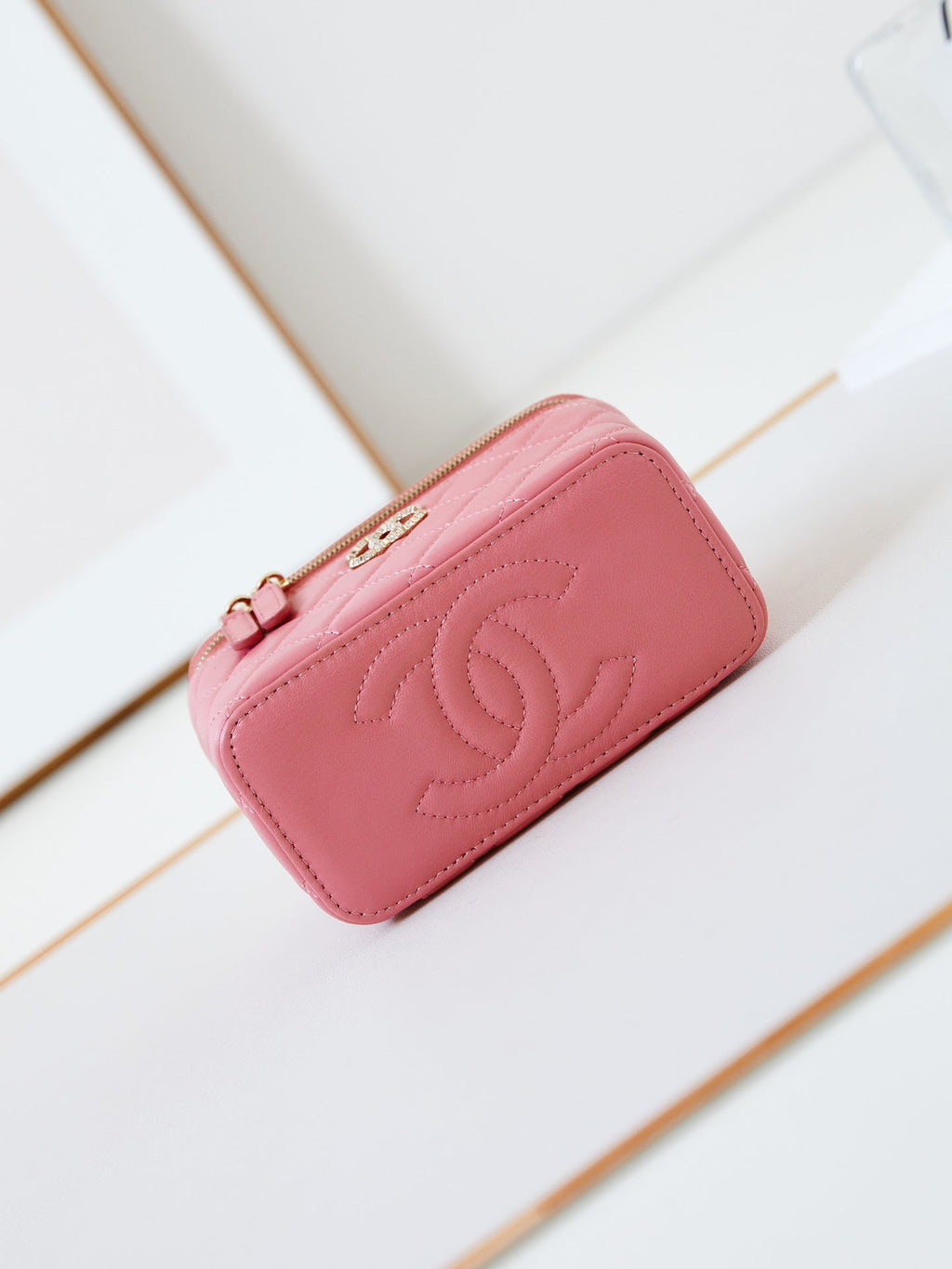 CHANEL 25S MINI VANITY BAG 16 CM IN PEACHY PINK LAMBSKIN WITH CRYSTAL-EMBELLISHED  LOGO